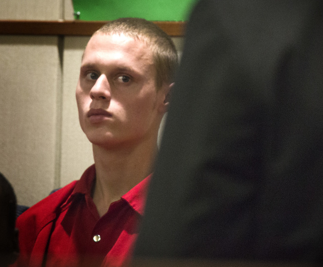 Michael Boyd Jr., 19, appears  in Henderson Justice Court on Wednesday, Sept. 3, 2014.  He is charged with felonies for putting a barrel of fuel on a bonfire that exploded and led to seven Basic H ...