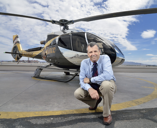 Bob Engelbrecht, CEO of Sundance Helicopters, is shown with one of the company's new EC130T2 Airbus helicopters at the Sundance terminal at 5596 Haven St. in Las Vegas on April 11. The terminal is ...