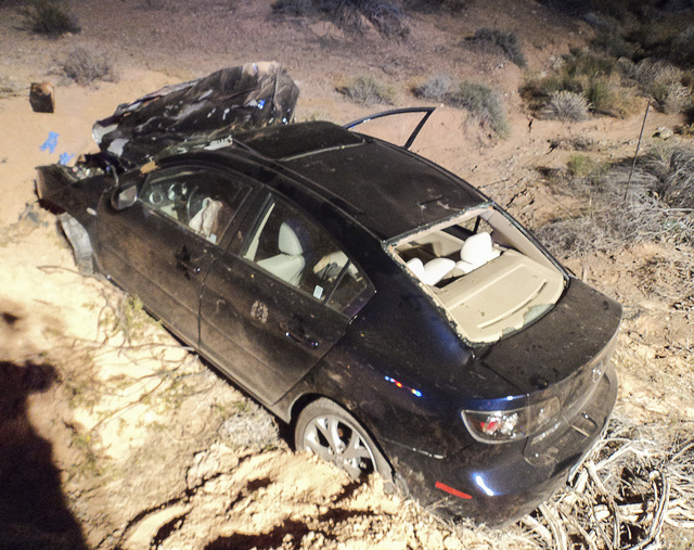Handout photo of a car that was damaged in a collision with a cow near  Cliven Bundy's Ranch on April 14, 2014. (COURTESY PHOTO)