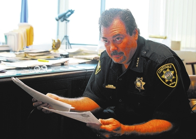 Las Vegas Township Constable John Bonaventura looks on during an interview in his downtown Las Vegas office on Tuesday, May 27, 2014. Clark County recently replaced computers in the constable's of ...