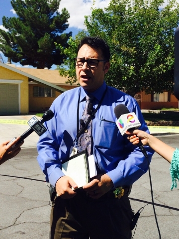 Metro Sgt. Steve Candelas addresses the media about a home invasion in the 1700 block of Breezewood Drive, near Vegas and North Torrey Pines drives, Thursday, Sept. 25, 2014. (Bizu Tesfaye/Las Veg ...
