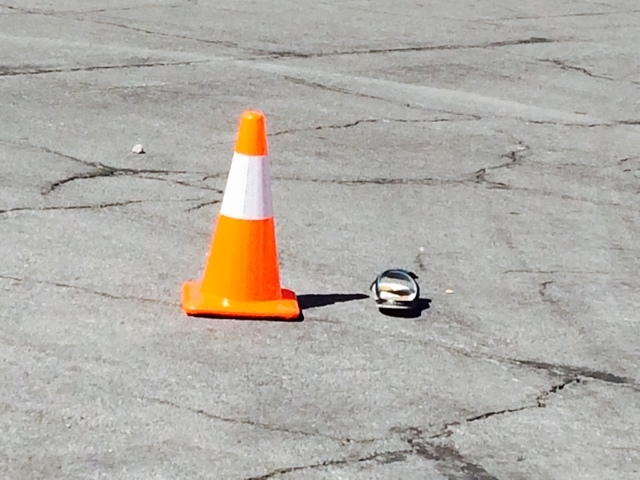 A cone marks a single shoe in the street near a home invasion in the 1700 block of Breezewood Drive, near Vegas and North Torrey Pines drives, Thursday, Sept. 25, 2014. (Bizu Tesfaye/Las Vegas Rev ...