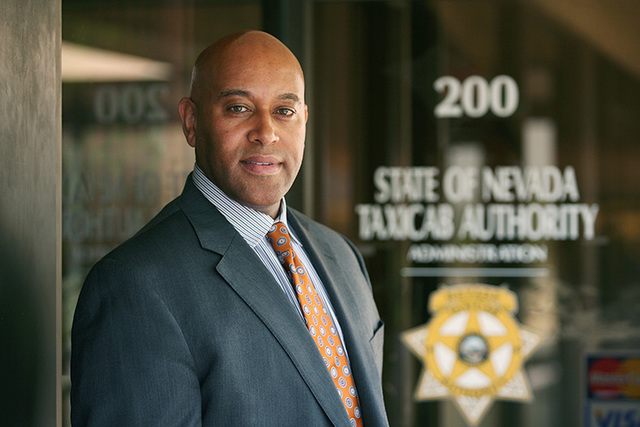 Taxicab Authority Administrator Charles Harvey stands near the entrance to the State of Nevada Taxicab Authority located at 1785 E. Sahara Ave. #200 Wednesday, March 5, 2014, in Las Vegas. Harvey ...