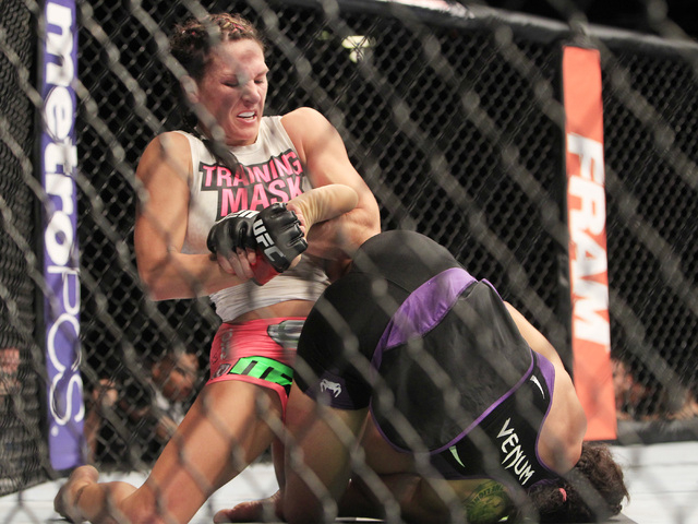 Cat Zingano tries to submit Amanda Nunes during their fight at UFC 178 Saturday, Sept. 27, 2014 at the MGM Grand Garden Arena in Las Vegas. (Sam Morris/Las Vegas Review-Journal)