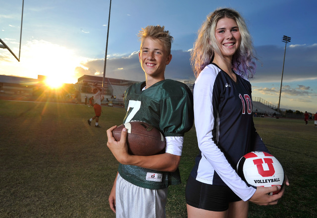 Brother and sister, Kenyon, left, and Berkeley Oblad, pose at Liberty High School on Tuesday, Sept. 16, 2014. Kenyon, a freshman, is the starting quarterback for Liberty's varsity football team. ...