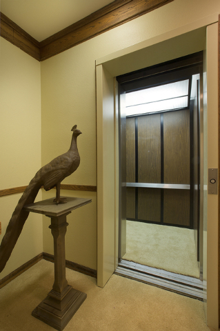 Courtesy photo 
The two-story mansion is connected by an elevator. This peacock sculpture is a reminder of the flock that still lives on the ranch.