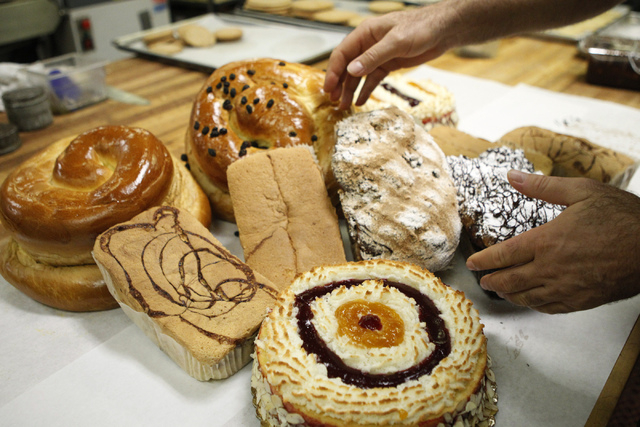 Savvas Andrews, owner of Bagel Cafe, displays baked goods for sale for the Jewish holiday Rosh Hashanah at Bagel Cafe, 301 N. Buffalo Drive, in Las Vegas Wednesday, Sept. 17, 2014. (Erik Verduzco/ ...