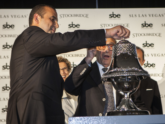 Sam Nazarian, left, CEO of SBE Entertainment,  and his father Younes during the ceremonial ringing of the bell at  SLS Las Vegas  on Friday Aug. 22, 2014. (Jeff Scheid/Las Vegas Review-Journal)
