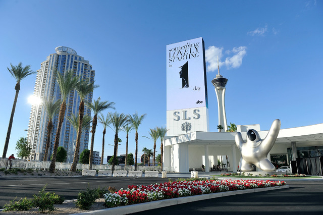 Philippe Starck's sculpture "Saam by Starck" , lower right, is displayed at the front entrance at SLS Las Vegas during the grand opening celebration on Friday, Aug. 22, 2014.  (David Becker/Las Ve ...