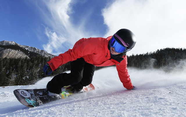 Professional snowboarder Amanda Propst leans into a turn as she makes her way down a run at the Las Vegas Ski and Snowboard Resort on Mount Charleston, Jan. 2, 2013. (Jason Bean/Las Vegas Review-J ...
