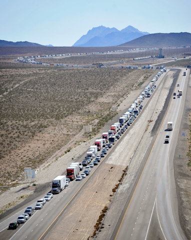 Traffic is backed up along the northbound side of Interstate 15 for several miles on Tuesday, Sept. 9, 2014. Highway officials are rerouting all vehicle traffic to US Highway 93 do to highway dama ...