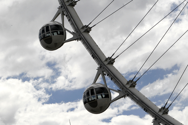 Clouds hang behind the High Roller on the Las Vegas Strip in Las Vegas on Sunday, Sept. 7, 2014. Moisture and clouds caused by Tropical Storm Norbert blanketed the valley on Sunday. (Justin Yurkan ...