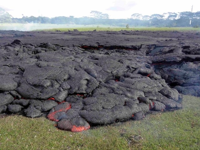 The lava flow from the Kilauea Volcano is seen in a U.S. Geological Survey image taken near the village of Pahoa, Hawaii, Sunday, Oct. 26, 2014. (Reuters/U.S. Geological Survey handout)