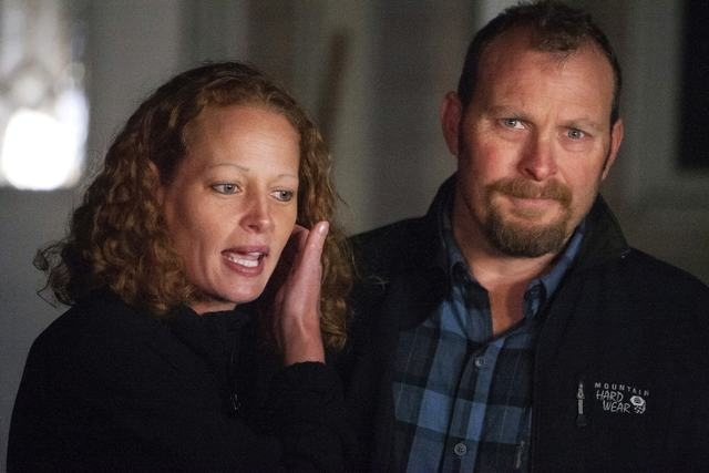 Nurse Kaci Hickox and her boyfriend, Ted Wilbur, address the media outside their home in Fort Kent, Maine, Wednesday, Oct. 29, 2014. A Maine judge issued a temporary order on Friday, Oct. 31, enfo ...