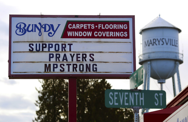 A variety of supportive signs have appeared on businesses along State Street in Marysville, Wash., Saturday, Oct. 25, 2014, after a deadly shooting Friday at Marysville-Pilchuck High School. (AP P ...