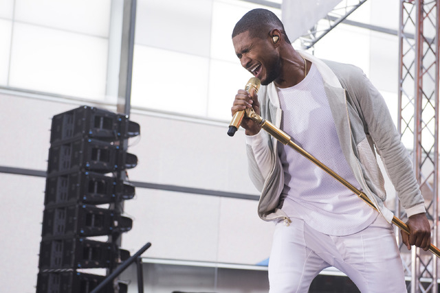 FILE - In this Sept. 5, 2014 file photo, Usher performs on NBC's "Today" show in New York. Usher launches his UR Experience World Tour in Montreal on Saturday, Nov. 1. (Photo by Charles  ...