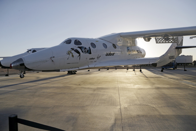 Virgin Galactic's SpaceShipTwo is shown at a Virgin Galactic hangar at Mojave Air and Space Port in Mojave, California, Sept. 25, 2013. Virgin Galactic has reported an unspecified problem during a ...