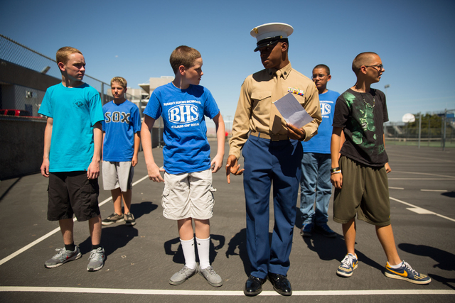 Alec Klasna, 14, third from left, takes direction from Ivorian Scott, third from right, during the Basic High School Junior ROTC program at the school Friday, Sept. 19, 2014. (Samantha Clemens-Ker ...