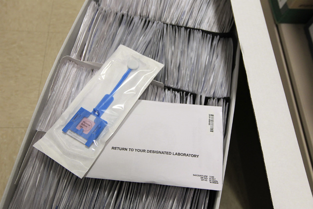 A DNA collection paddle rests on a box of DNA samples at Metro's forensics lab Wednesday, Sept. 24, 2014 in Las Vegas. (Sam Morris/Las Vegas Review-Journal)