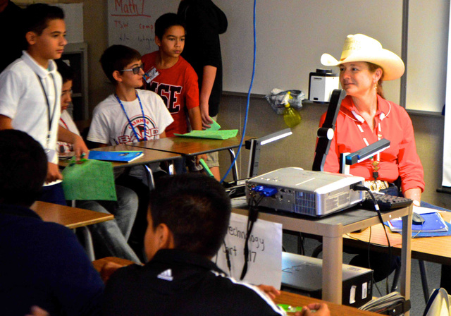 Employees from the Tronox Henderson Plant visited with students at Cashman Middle School, 4622 W. Desert Inn Road, Oct. 14 to talk about their profession and opportunities available in the field o ...