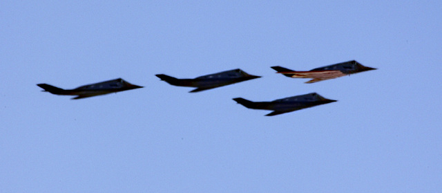 The last of four U.S. Air Force F-117A Nighthhawk stealth fighters fly in formation over the Lockheed Martin "Skunk Works" plant in Palmdale, California Tuesday, April 22, 2008, as it fl ...