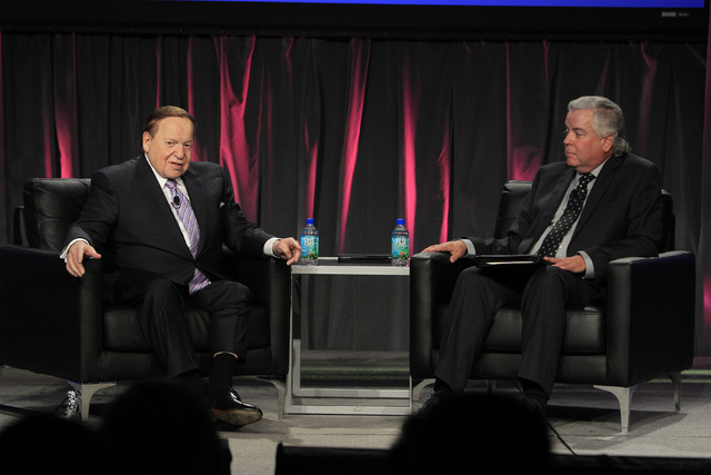 Las Vegas Sands CEO Sheldon Adelson is joined by moderator Roger Gros as he delivers a keynote address at Global Gaming Expo Wednesday, Oct. 1, 2014, at the Sands Convention Center. (Sam Morris/La ...