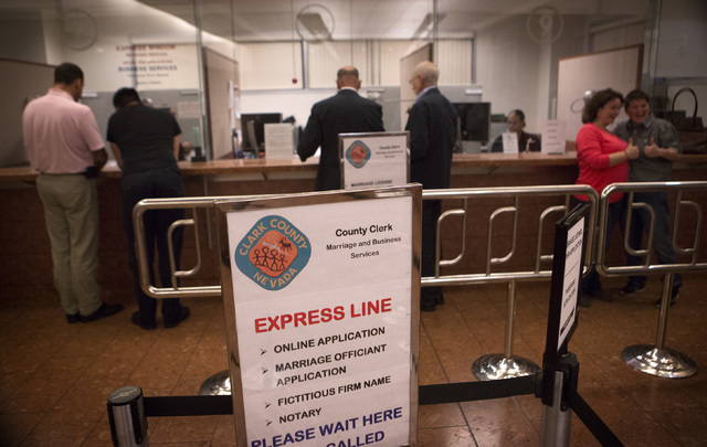Same-sex couples get marriage licenses at the  County License Bureau  on Thursday, Oct. 9, 2014.  Today is the first for  same-sex couples to get married in Clark County. (Jeff Scheid/Las Vegas Re ...