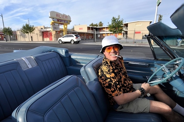 Jared Anderson as Hunter S. Thompson, rides up in his 1966 Cadillac during the 5th annual Halloween parade along East Fremont Street in Las Vegas on Friday, Oct. 31, 2014. (David Becker/Las Vegas ...
