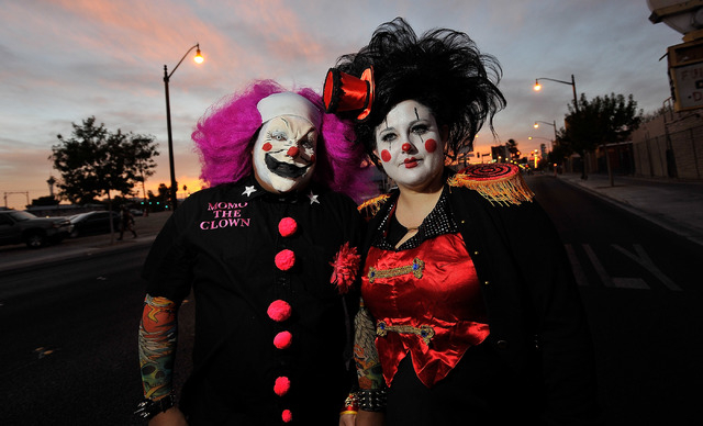 Alex Kalaw, left and Anna Fintikakis pose before the start of the 5th annual Halloween parade along East Fremont Street in Las Vegas on Friday, Oct. 31, 2014. (David Becker/Las Vegas Review-Journal)