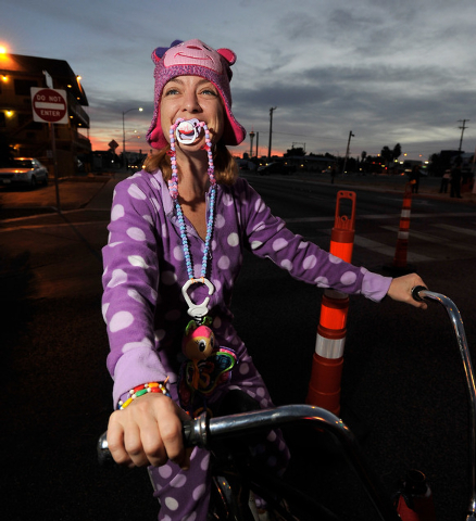 Hope Epert dons her purple pok-a-dot pajamas for the 5th annual Halloween parade along East Fremont Street in Las Vegas on Friday, Oct. 31, 2014. (David Becker/Las Vegas Review-Journal)