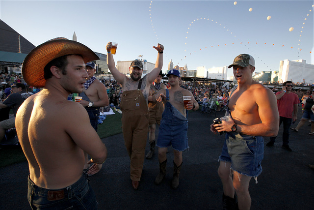 Fans listen to Dustin Lynch perform at the Route 91 Harvest country music festival at the MGM Resorts Village in Las Vegas on Sunday, October 5, 2014. (Justin Yurkanin/Las Vegas Review-Journal)