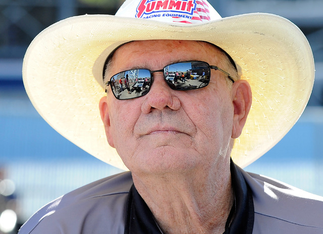 Team owner Ken Black watches his pro stock dragsters line up before a qualifying session at the 14th annual NHRA Nationals at The Strip at the Las Vegas Motor Speedway on Friday, Oct. 31, 2014. (D ...