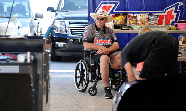 Team owner Ken Black, watches his mechanics work in the pit area before a pro stock qualifying session at the 14th annual NHRA Nationals at The Strip at the Las Vegas Motor Speedway on Friday, Oct ...