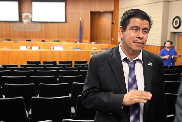North Las Vegas City Councilman Isaac Barron declines to talk to the news media before a council meeting at City hall Wednesday, Oct. 1, 2014. Animal activists were expected to be at the meeting t ...