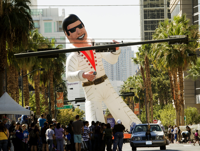 An inflatable Elvis float sponsored by Three Square during the 
 Nevada Day Parade on Fourth Street in downtown Las Vegas on Friday, Oct. 31. Thousands lined the street to celebrate Nevada's  Sesq ...