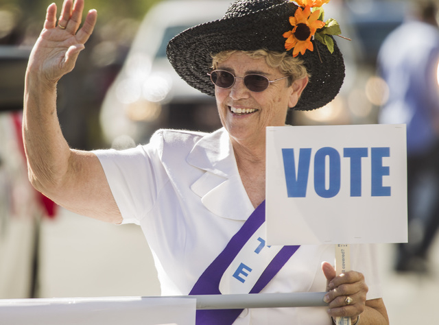 Jan Biggerstaff with the Nevada League of Voter Las Vegas march in the  Nevada Day Parade on Fourth Street in downtown Las Vegas on Friday, Oct. 31. Thousands lined the street to celebrate Nevada' ...
