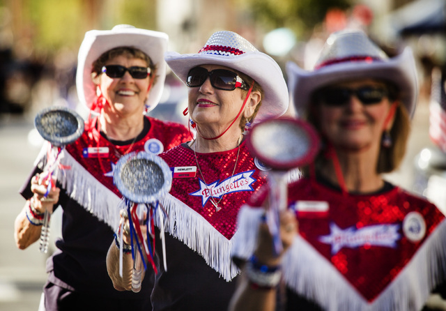 The Plungettes from Texas, from left, Wilda Meixner, Hewlett Wittie and Ronni Davis during the Nevada Day Parade on Fourth Street in downtown Las Vegas on Friday, Oct. 31. Thousands lined the st ...