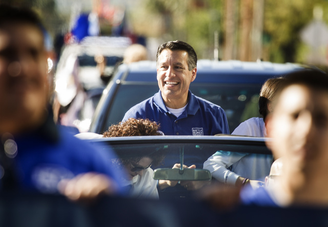 Nevada Governor Brian Standoval during the   Nevada Day Parade on Fourth Street in downtown Las Vegas on Friday, Oct. 31. Thousands lined the street to celebrate Nevada's  Sesquicentennial. (Jeff  ...