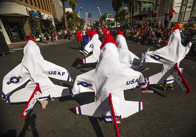 Students from Manch Elementary School dressed in the school's mascot  march in   Nevada Day Parade on Fourth Street in downtown Las Vegas on Friday, Oct. 31. Thousands lined the street to celebrat ...