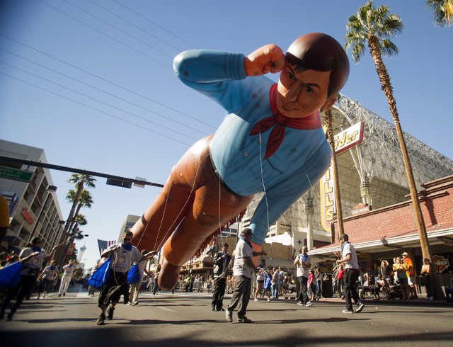 The Cox Cable inflatable cowboy during the Nevada Day Parade on Fourth Street in downtown Las Vegas on Friday, Oct. 31. Thousands lined the street to celebrate Nevada's Sesquicentennial. (Jeff ...