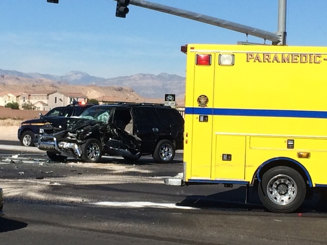 The intersection of Blue Diamond Road and Durango Drive is partially blocked after a Clark County fire truck and a smaller vehicle collided Friday morning, Oct. 31, 2014. (Bizuayehu Tesfaye/Las Ve ...