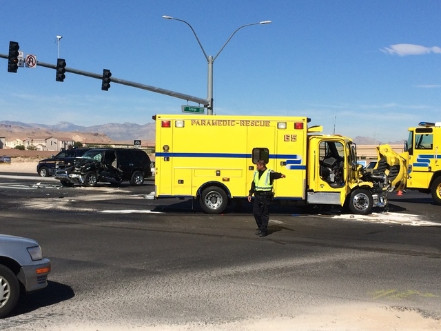 The intersection of Blue Diamond Road and Durango Drive is partially blocked after a Clark County fire truck and a smaller vehicle collided Friday morning, Oct. 31, 2014. (Bizuayehu Tesfaye/Las Ve ...