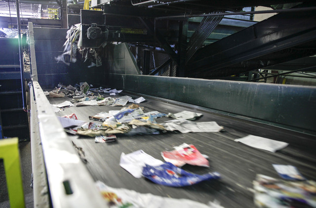 A conveyer sorts recently unloaded recyclables at the Republic Services sorting facility at 333 West Gowan Road in North Las Vegas Friday, Dec. 21, 2013. (Robert Winn/Las Vegas Review-Journal)
