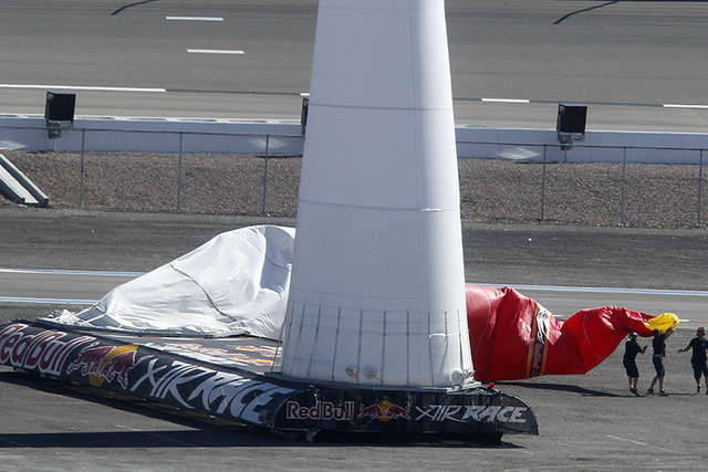 Crew members try to re-inflate a pylon at the Red Bull Air Race world Championship race the Las Vegas Motor Speedway in Las Vegas on Sunday, Oct. 12, 2014. (Justin Yurkanin/Las Vegas Review-Journal)