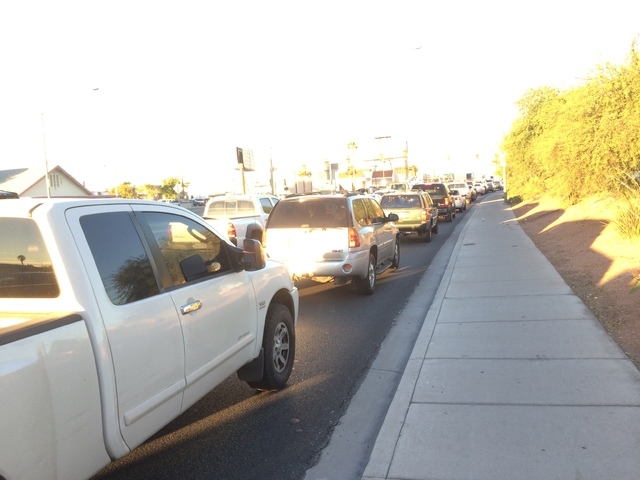 Traffic is backed up Friday morning, Oct. 31, 2014, at Tropicana Avenue and Swenson Street after an accident closed part of the intersection. (Bizu Tesfaye/Las Vegas Review-Journal)