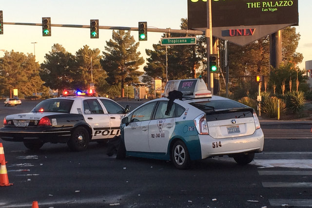 An accident at Tropicana Avenue and Swenson Street early Friday morning, Oct. 31, 2014, closed the eastbound lanes of Tropicana. (Bizu Tesfaye/Las Vegas Review-Journal)