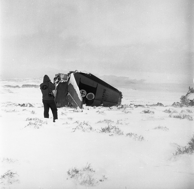 A photographer documents the Bonanza Airlines Flight 114 plane crash on Nov. 16, 1964 (Courtesy Las Vegas News Bureau, Cook)