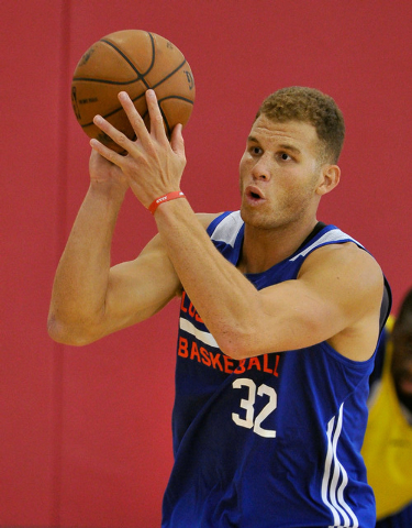Los Angeles Clippers' Blake Griffin passes the ball during practice at NBA basketball training camp at the Mendenhall Center at UNLV on Tuesday, Sept. 30, 2014. (David Becker/Las Vegas Review-Journal)