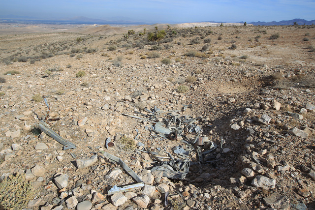 A pile of debris is seen at the crash site of Bonanza Flight 114 about 15 miles southwest of McCarran International Airport Thursday, Nov. 13, 2014. (Sam Morris/Las Vegas Review-Journal)