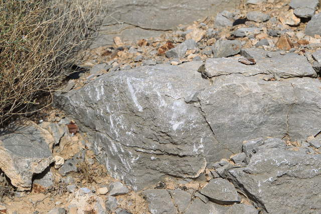 Scarring from impact is still visible as white scratches on rock at the crash site of Bonanza Flight 114 about 15 miles southwest of McCarran International Airport Thursday, Nov. 13, 2014. (Sam Mo ...
